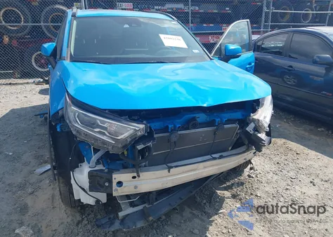 2021 Toyota Rav4 Hybrid Xle z USA, uszkodzony, nr VIN 4T3RWRFVXMU035059